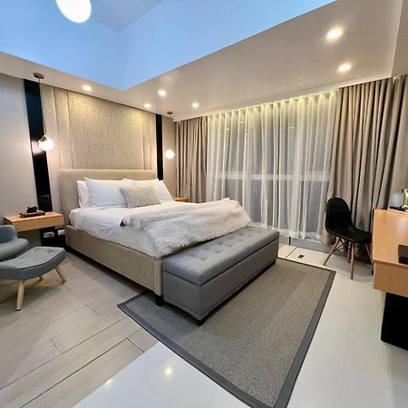 Hotel Vibe Condo At Uptown Parksuites Bgc Taguig Bagian luar foto