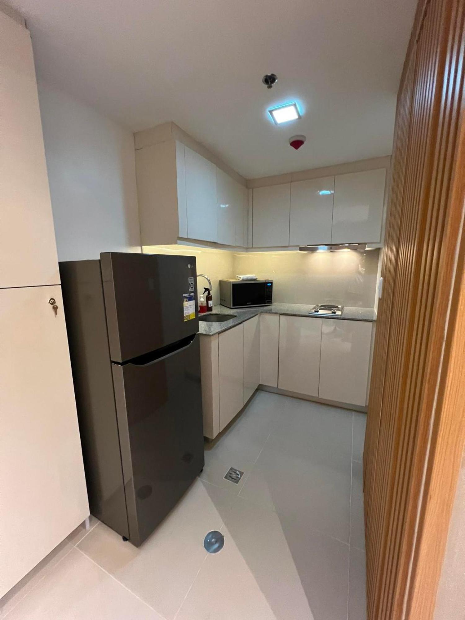 Hotel Vibe Condo At Uptown Parksuites Bgc Taguig Bagian luar foto